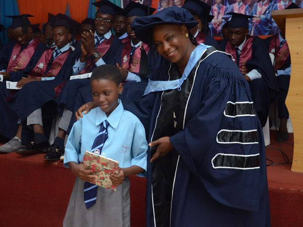 Teacher helping student